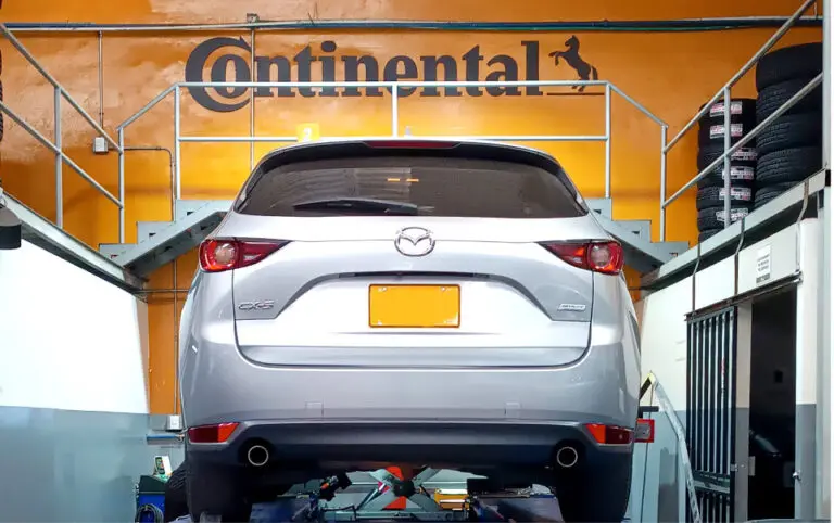 Servicio de alineación a vehículo